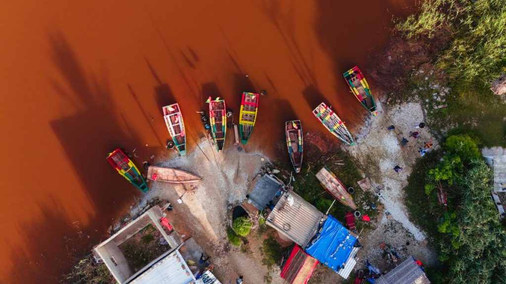 aerial view of fishing boats on lac rose senegal